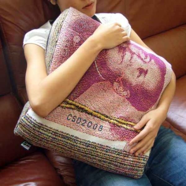 A pillow that looks like a bank note