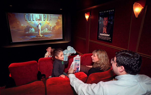 family eating and watching movie