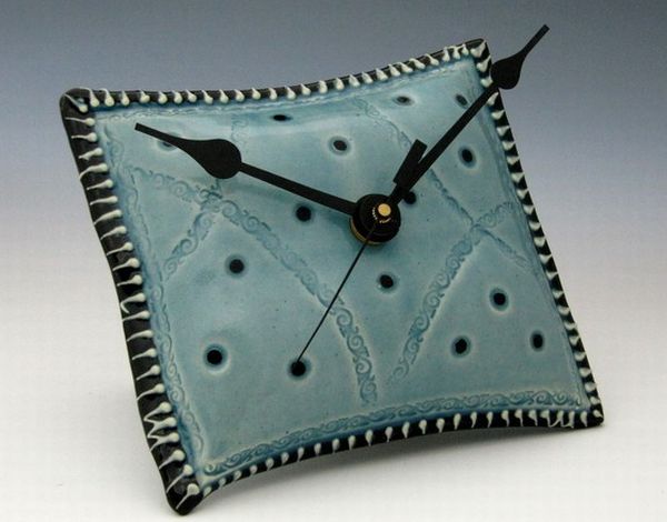 Unique pillow shaped ceramic wall clock