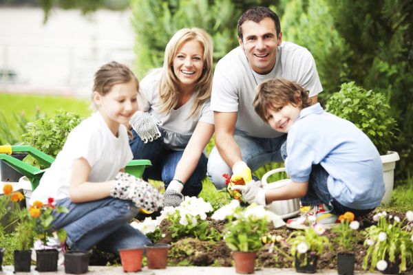 Portrait of a family gardening.