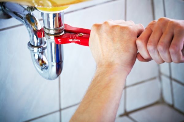 removing the drain pipe under the sink