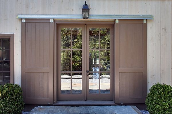 barn style sliding doors outside the glass doors