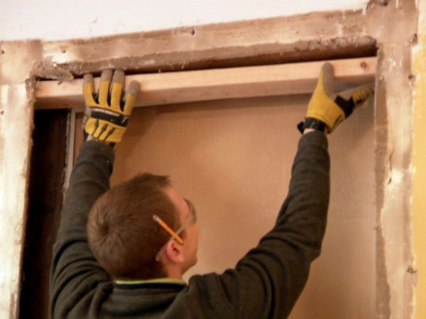 Install a protective shield or frame around the fireplace