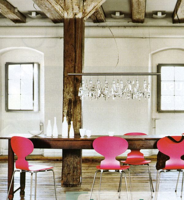 Modern chairs mixed with antique furniture