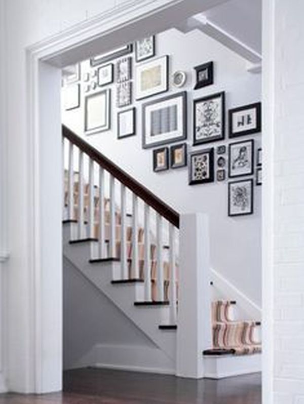 hang your kids’ photos is the staircase wall