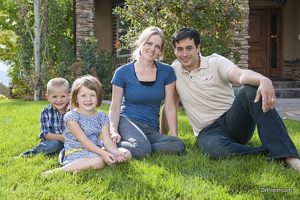 family sitting in lawn