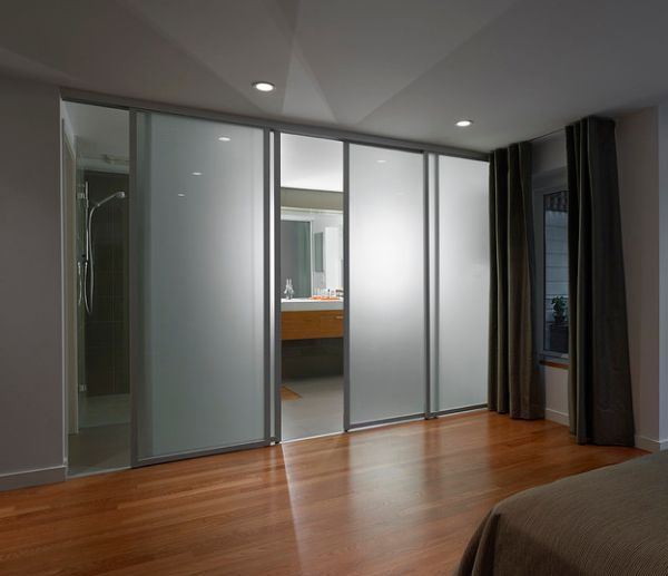 glass partition separate two adjacent rooms