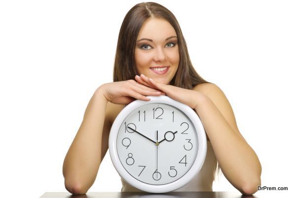 Young girl with clock