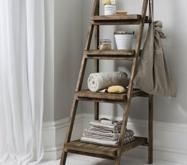 wooden ladder turned into a towel rack