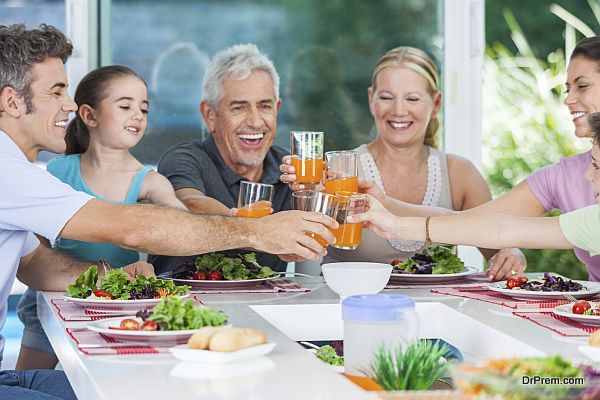 multy-generation family eat at table