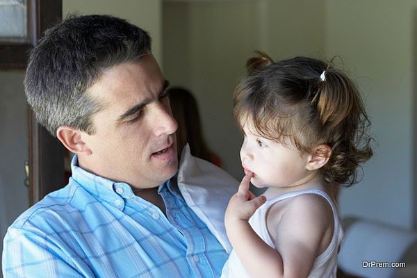 Close-up of a father face to face with his daughter