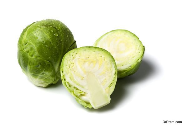 whole and halved brussels sprouts isolated