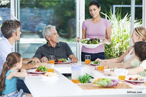 multy-generation family eat at table