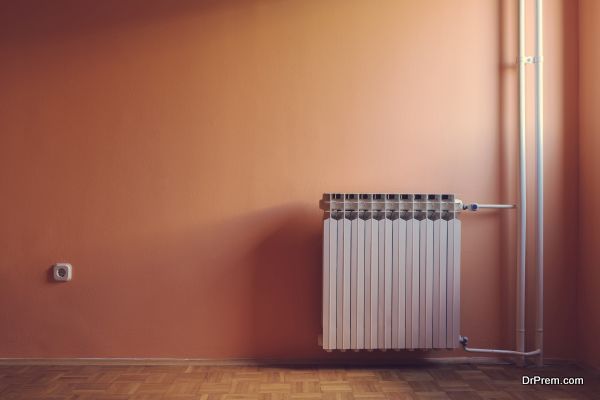 Pastel retro color of windows illuminated empty room with radiator