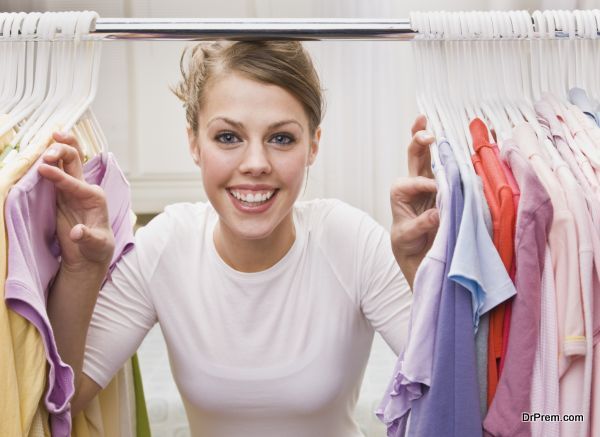 Woman looking through closet