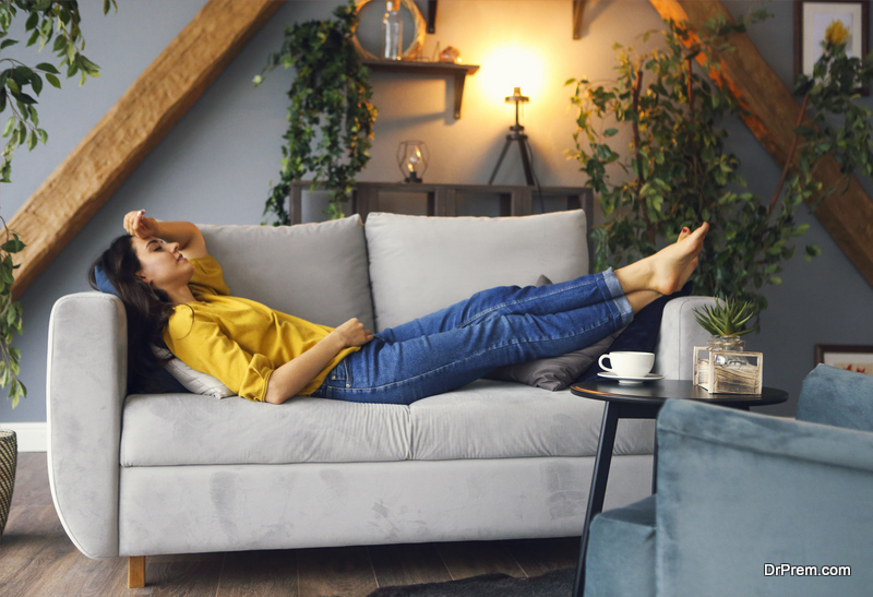 Young brunette woman relaxing on the couch