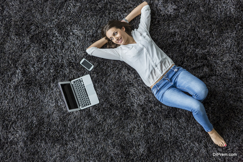 woman lying on the Rug