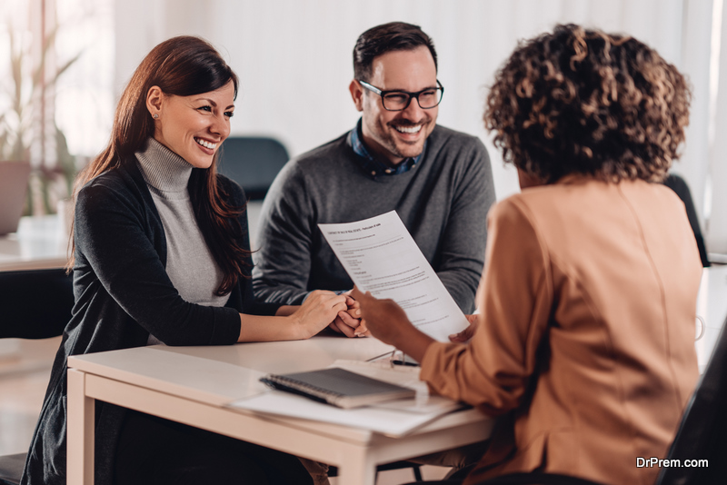 couple-talking-with-Insurance-Adjuster