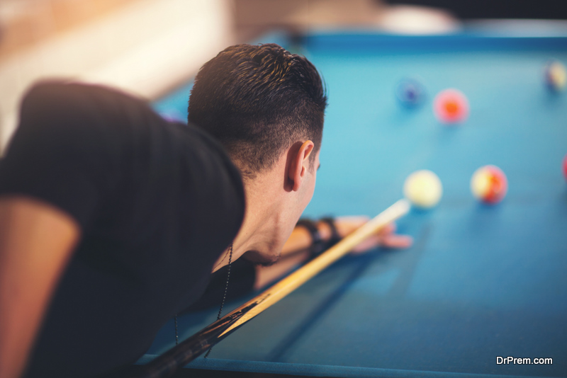 man-enjoying-billiards