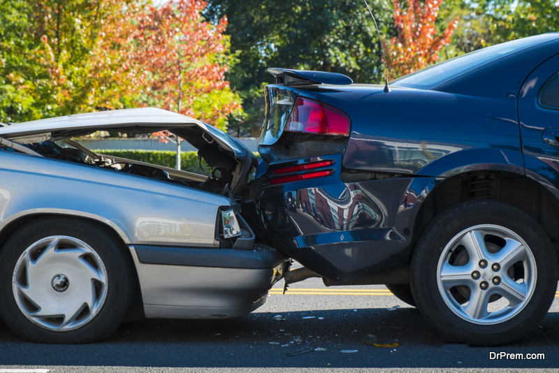 Auto accident involving two cars on a city street