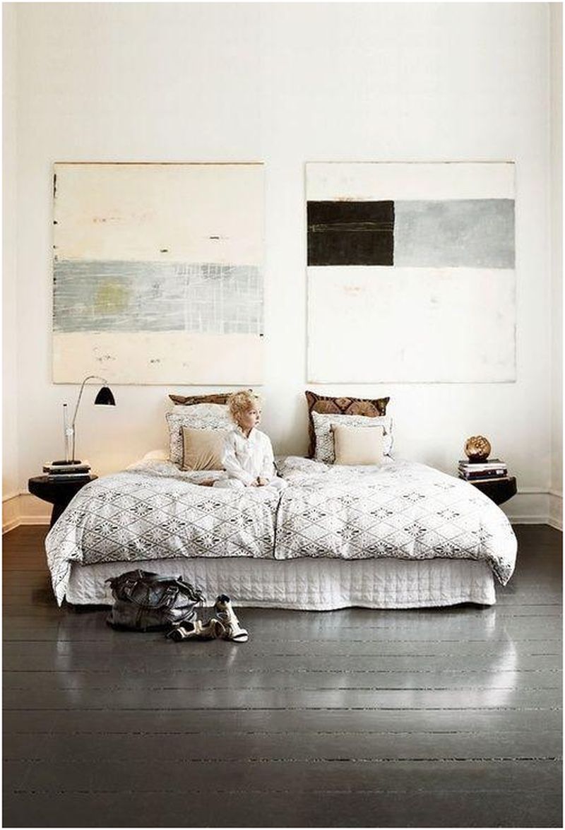 Oversized art inside a grey bedroom