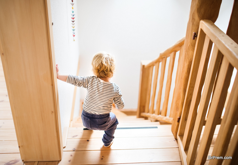 Toddler boy in dangerous situation at home